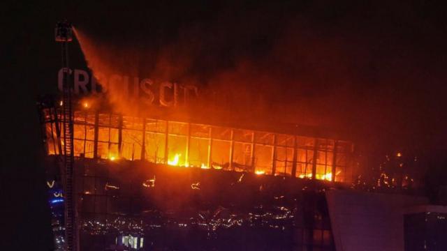 Russian firefighters extinguish a fire on the Crocus City Hall concert venue following a shooting in Krasnogorsk